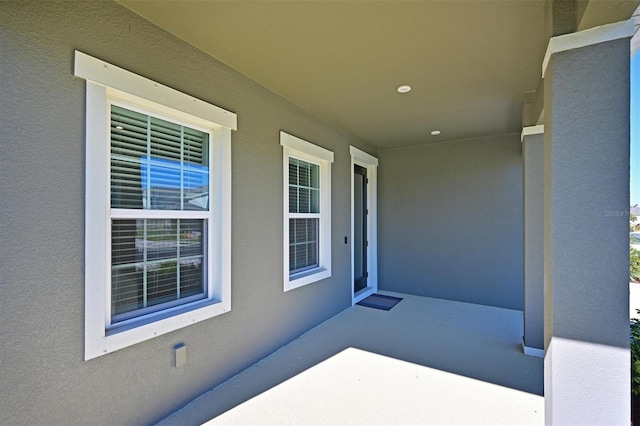 entrance to property with a porch