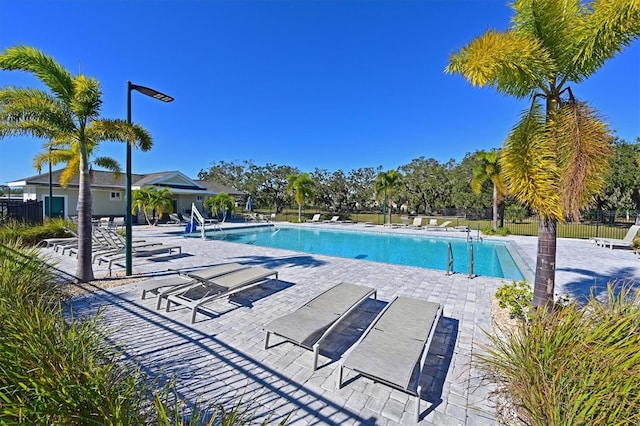 view of pool featuring a patio area