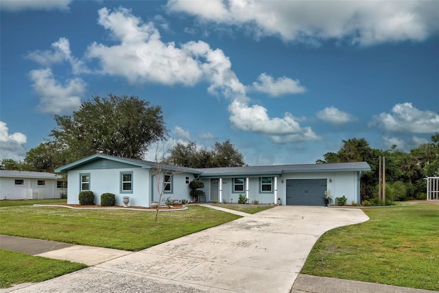 ranch-style house featuring a front yard and a garage