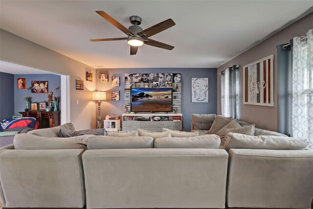 living room featuring ceiling fan