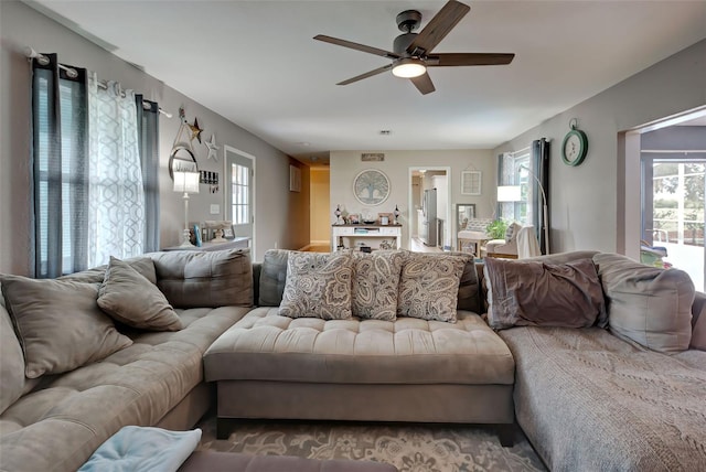 living room featuring ceiling fan