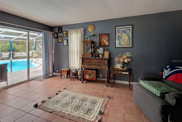 sitting room featuring light tile patterned floors