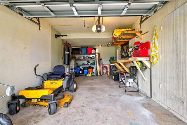 garage featuring a garage door opener