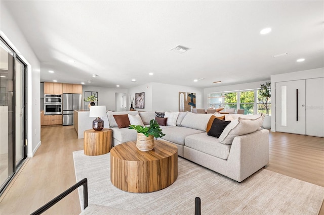 living room with light wood-type flooring