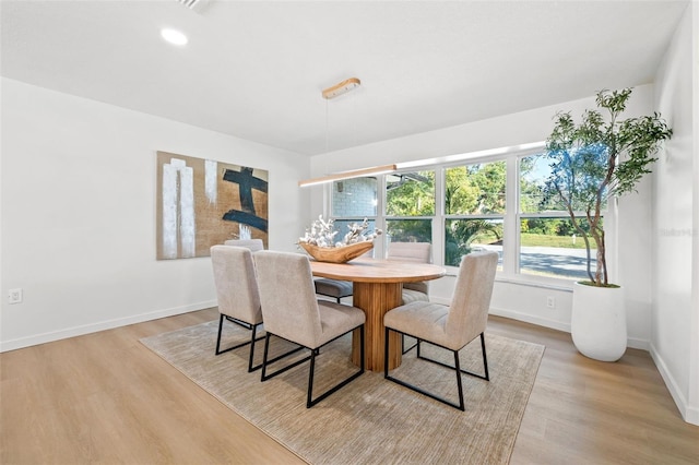 dining room featuring light wood-type flooring