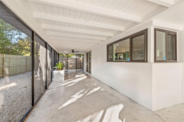 exterior space with ceiling fan