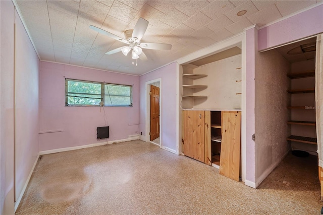 unfurnished bedroom featuring ceiling fan