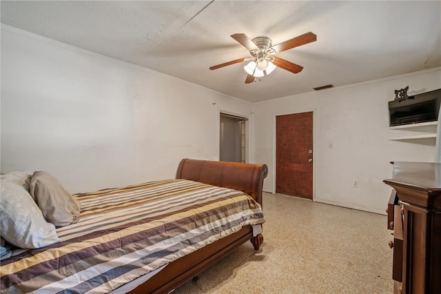 bedroom with a textured ceiling and ceiling fan