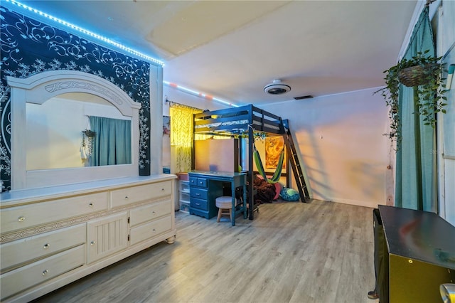 bedroom featuring light wood-type flooring