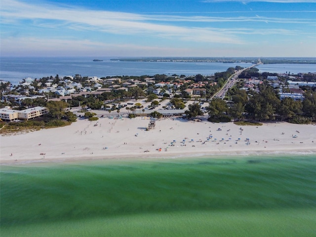 bird's eye view with a view of the beach and a water view