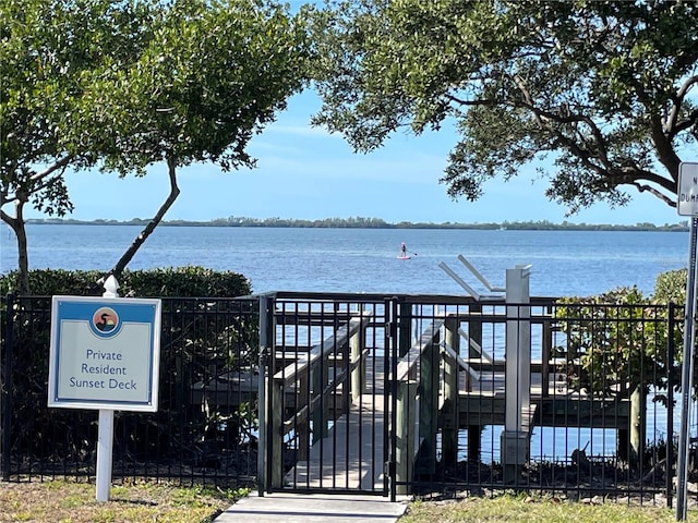 surrounding community featuring a water view