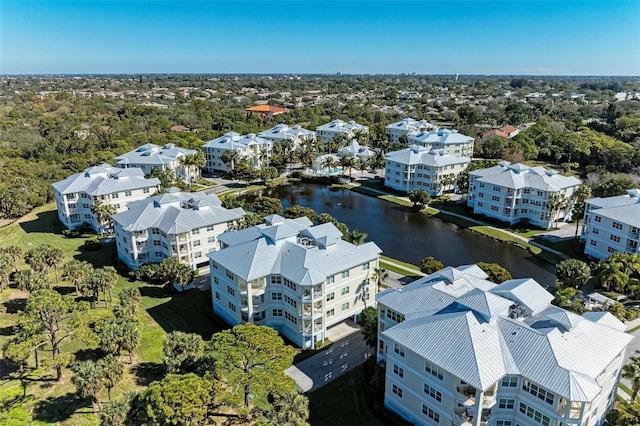 drone / aerial view with a water view