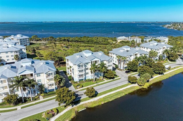 7830 34th Ave W Unit 102, Bradenton, FL 34209 - drone / aerial view of a nearby body of water and apartment complex / building
