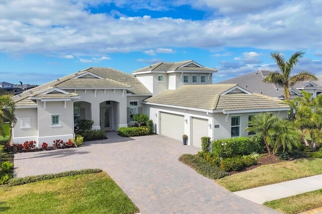 view of front of property featuring a garage