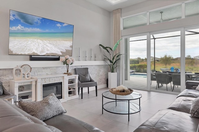 tiled living room with plenty of natural light