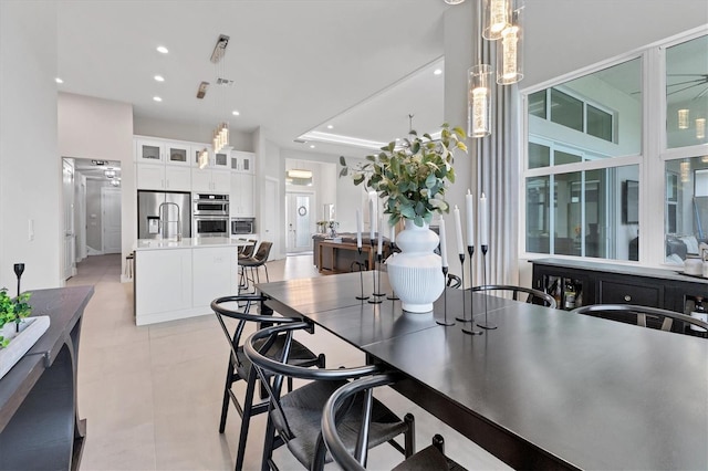 dining area with a tray ceiling