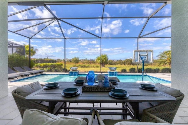 view of pool featuring a lanai and a patio area