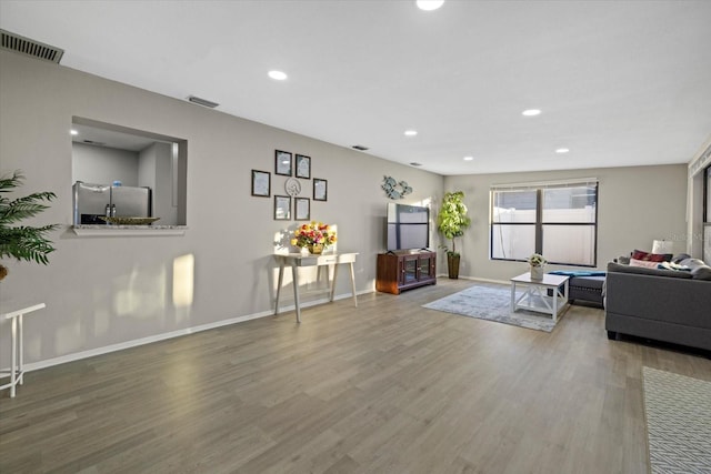 living room with hardwood / wood-style floors