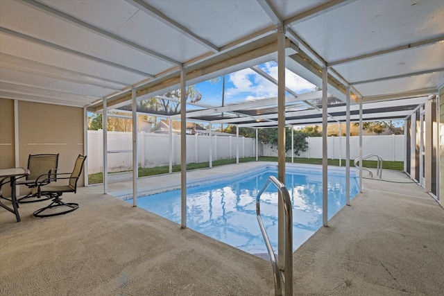 view of pool with a lanai and a patio area