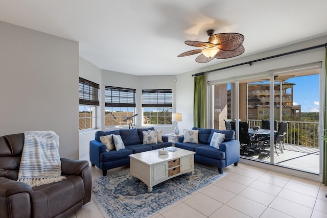 living room featuring ceiling fan and light tile patterned floors