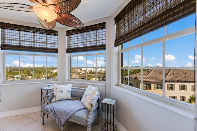 sunroom / solarium with ceiling fan