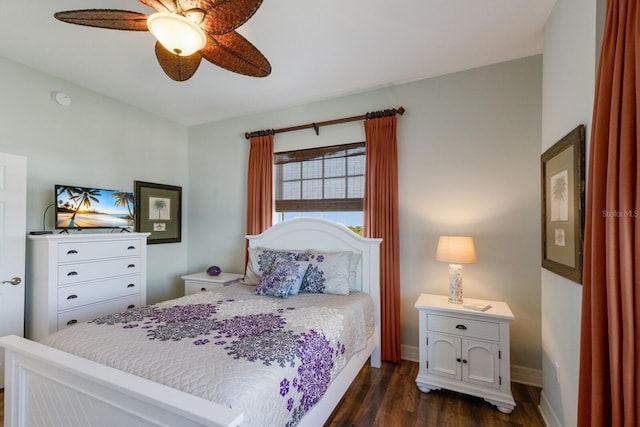 bedroom featuring ceiling fan and dark hardwood / wood-style floors