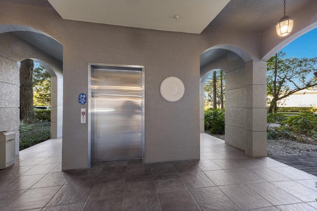 view of patio / terrace featuring elevator