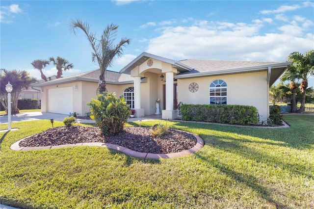 single story home featuring a front lawn and a garage