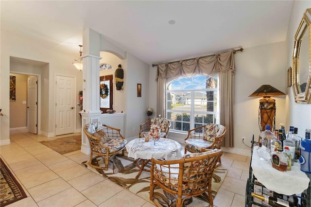 tiled dining space with ornate columns