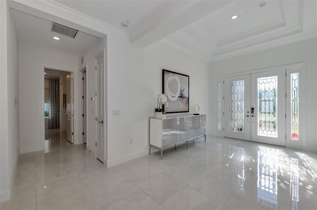 entryway with french doors and ornamental molding