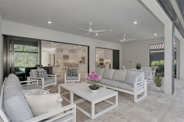 living room featuring ceiling fan