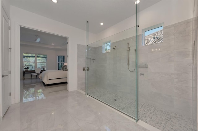 bathroom featuring a tile shower