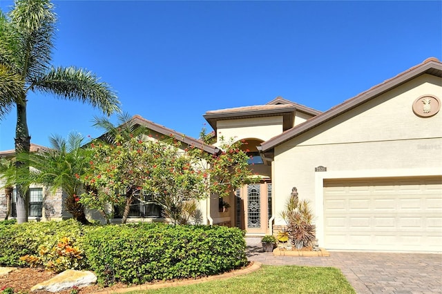 view of front of home with a garage