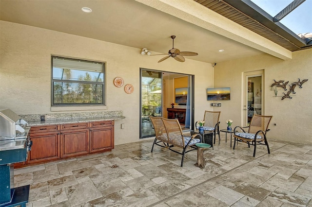 view of patio / terrace with ceiling fan