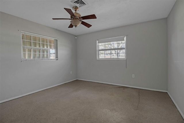 unfurnished room featuring carpet flooring and ceiling fan