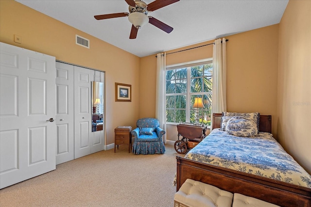 bedroom featuring carpet flooring, a closet, and ceiling fan