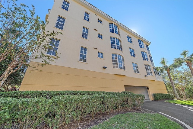 view of building exterior with a garage