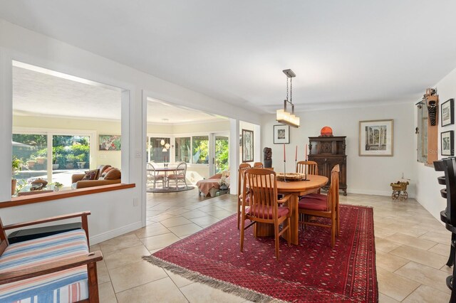 dining room featuring light tile patterned floors