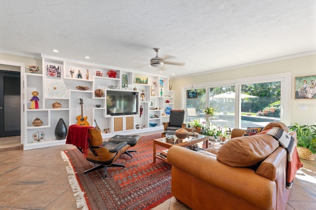 living room with a textured ceiling, ceiling fan, and crown molding