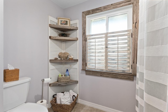 bathroom featuring toilet