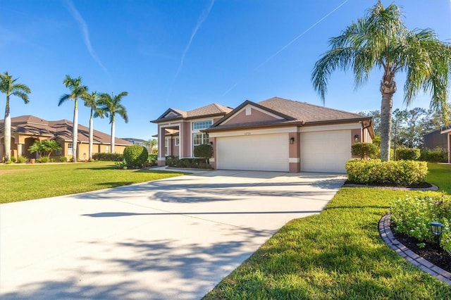 view of front of property featuring a garage and a front yard