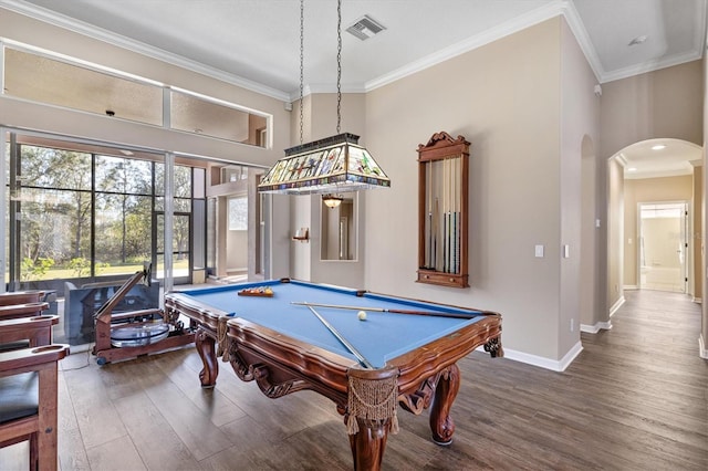 game room featuring hardwood / wood-style floors, ornamental molding, a high ceiling, and billiards