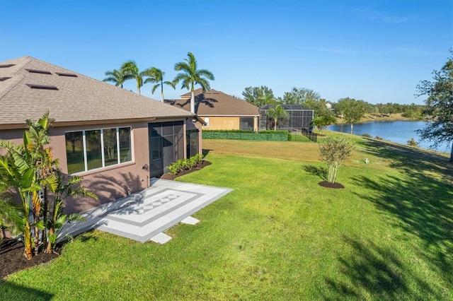 view of yard with a water view