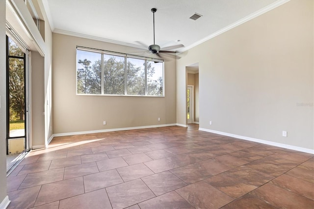 unfurnished room featuring ceiling fan and ornamental molding