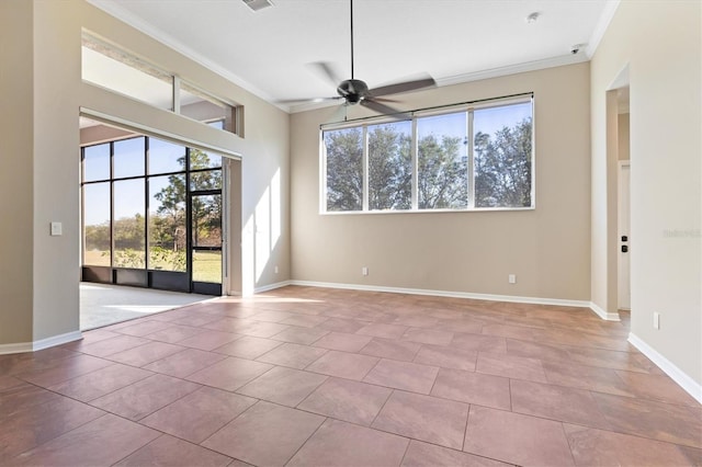 spare room with ceiling fan, light tile patterned flooring, and ornamental molding