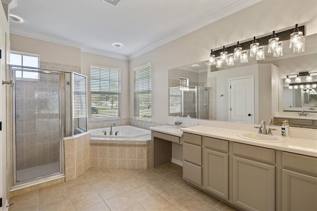 bathroom featuring tile patterned flooring, vanity, crown molding, and shower with separate bathtub