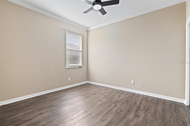 spare room with ceiling fan, dark hardwood / wood-style flooring, and ornamental molding