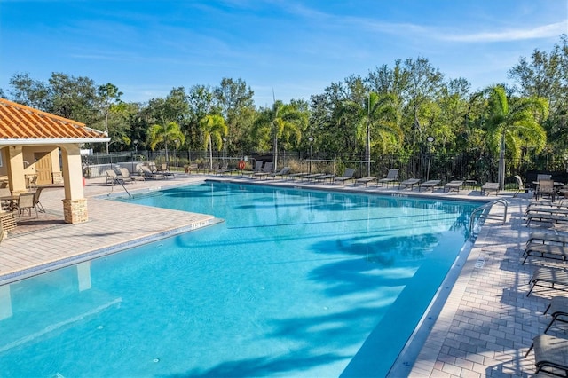 view of pool featuring a patio area