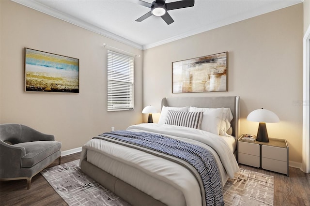 bedroom featuring hardwood / wood-style flooring, ceiling fan, and ornamental molding