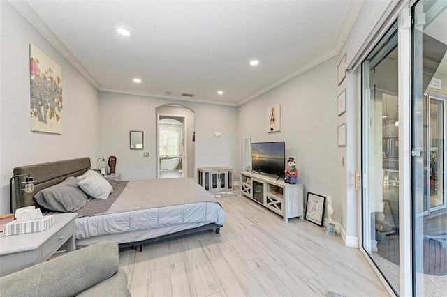 bedroom with arched walkways, ornamental molding, recessed lighting, and light wood-style floors